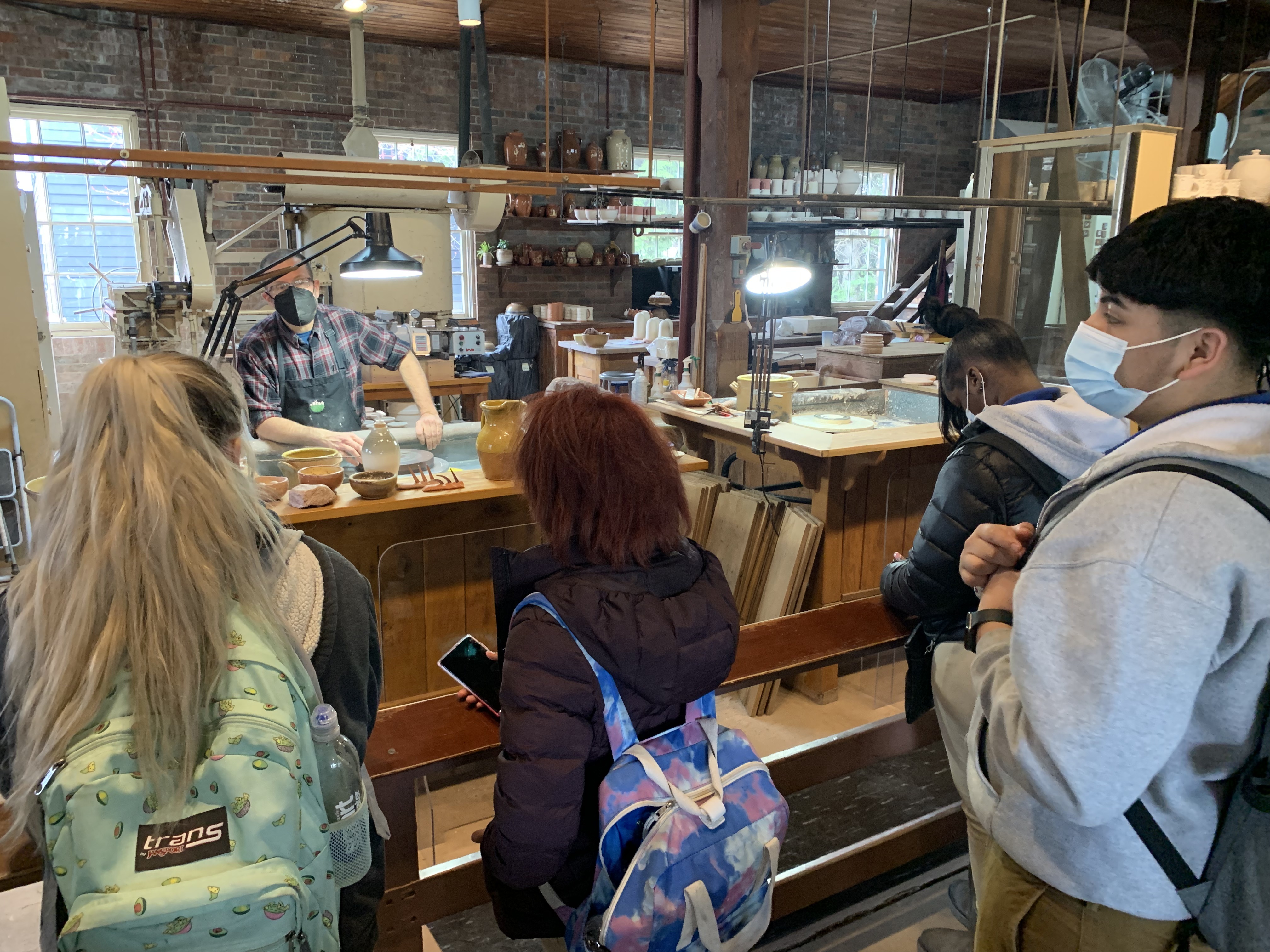 Mr. Koslowski's Village History Class Viewing a Presentation within the Ceramics Shop of the Greenfield Village.