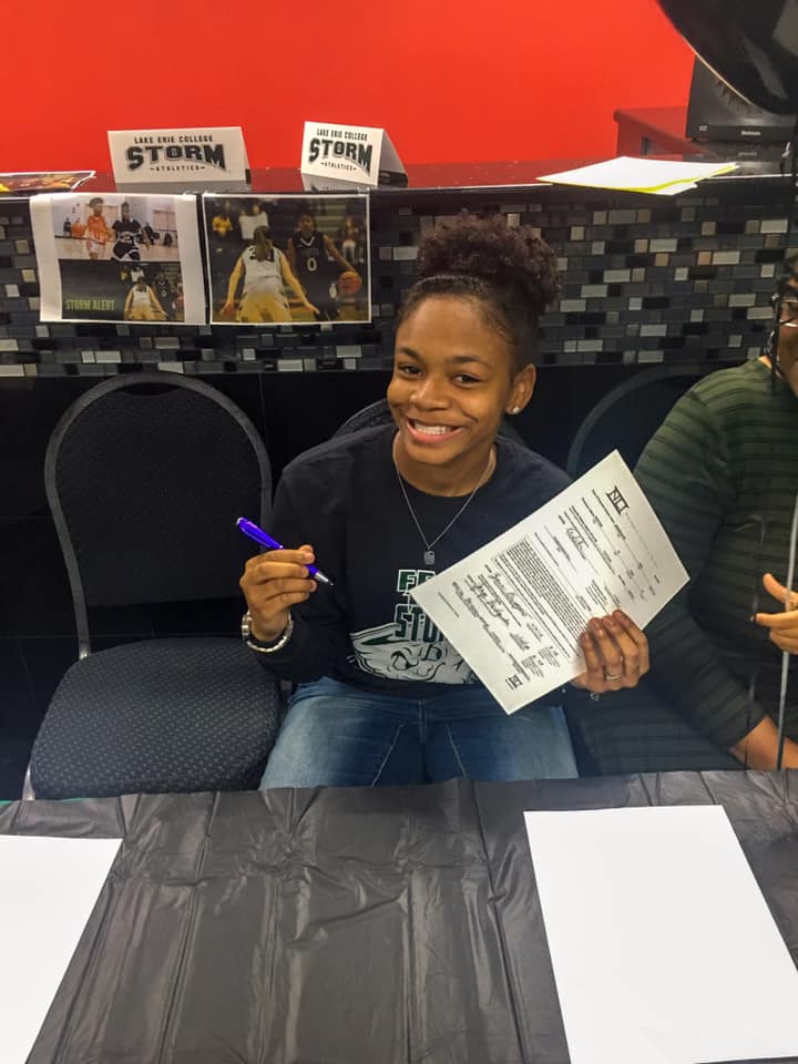 Zaria Bridgewater signing a letter intent to play basketball for Lake Erie Storm